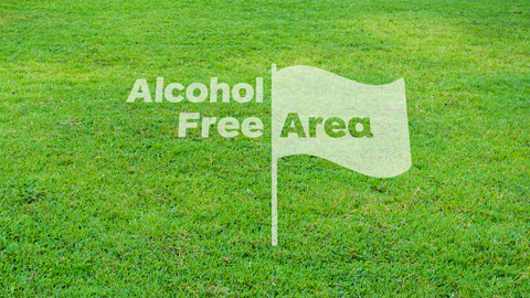 Photo showing how the Alcohol Free Area stencil could be applied to grass